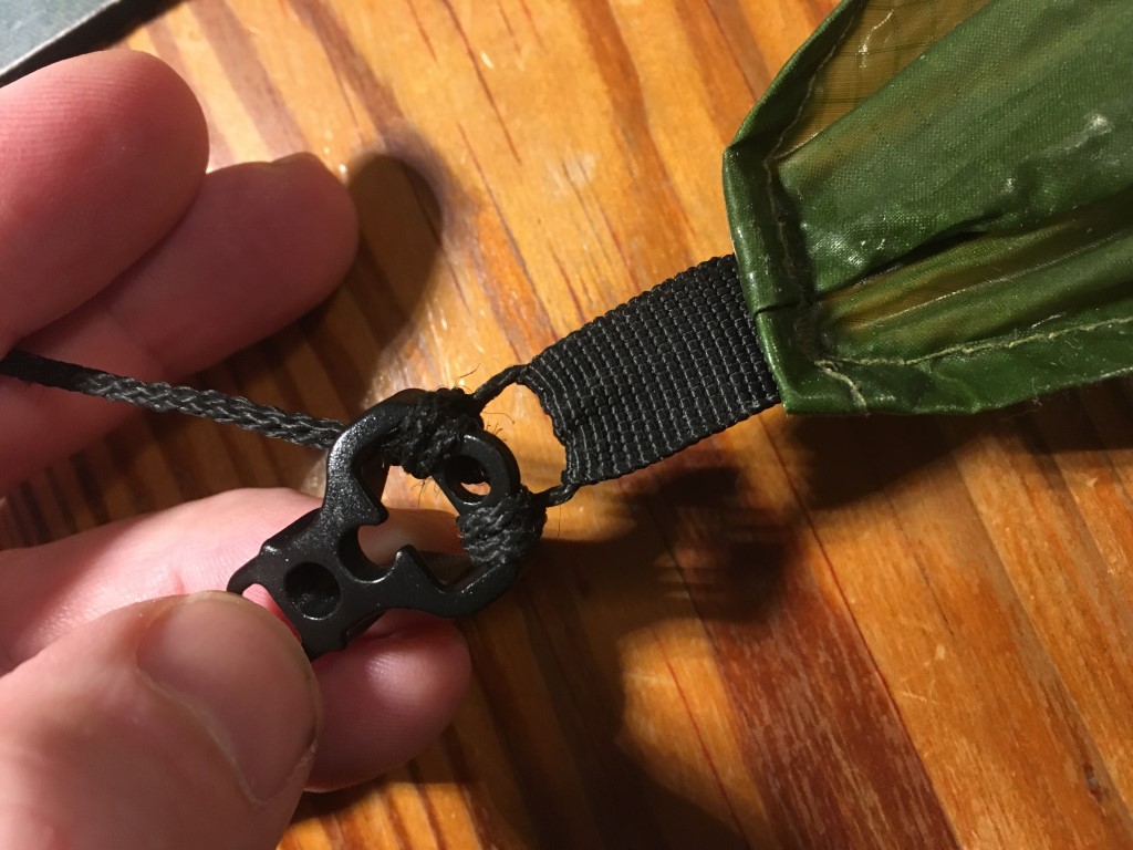 You can simply knot the Dyneema lines with an overhand knot to the existing loops.